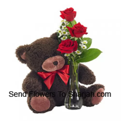 <b>Product Description</b><br><br>3 Red Roses With Some Ferns In A Glass Vase Along With A Cute 14 Inches Tall Teddy Bear<br><br><b>Delivery Information</b><br><br>* The design and packaging of the product can always vary and is subject to the availability of flowers and other products available at the time of delivery.<br><br>* The "Time selected is treated as a preference/request and is not a fixed time for delivery". We only guarantee delivery on a "Specified Date" and not within a specified "Time Frame".