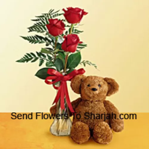 <b>Product Description</b><br><br>3 Red Roses With Some Ferns In A Glass Vase Along With A Cute 12 Inches Tall Teddy Bear<br><br><b>Delivery Information</b><br><br>* The design and packaging of the product can always vary and is subject to the availability of flowers and other products available at the time of delivery.<br><br>* The "Time selected is treated as a preference/request and is not a fixed time for delivery". We only guarantee delivery on a "Specified Date" and not within a specified "Time Frame".