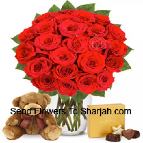 <b>Product Description</b><br><br>24 Red Roses With Some Ferns In A Glass Vase Accompanied With An Imported Box Of Chocolates And A Cute 12 Inches Tall Brown Teddy Bear<br><br><b>Delivery Information</b><br><br>* The design and packaging of the product can always vary and is subject to the availability of flowers and other products available at the time of delivery.<br><br>* The "Time selected is treated as a preference/request and is not a fixed time for delivery". We only guarantee delivery on a "Specified Date" and not within a specified "Time Frame".