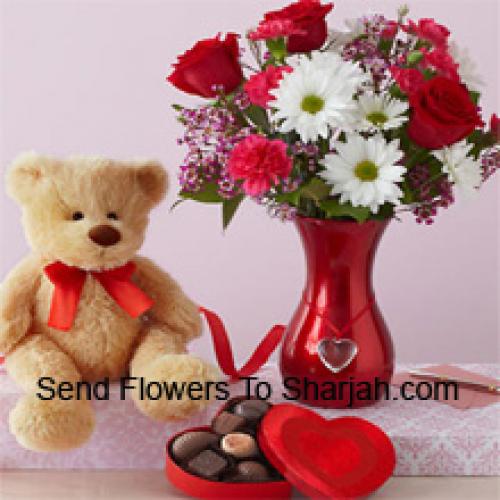 Roses et Gerberas avec un mignon ours en peluche et des chocolats