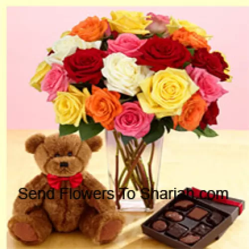 <b>Product Description</b><br><br>24 Mixed Colored Roses With Some Ferns In A Glass Vase, A Cute 12 Inches Tall Brown Teddy Bear And An Imported Box Of Chocolates<br><br><b>Delivery Information</b><br><br>* The design and packaging of the product can always vary and is subject to the availability of flowers and other products available at the time of delivery.<br><br>* The "Time selected is treated as a preference/request and is not a fixed time for delivery". We only guarantee delivery on a "Specified Date" and not within a specified "Time Frame".