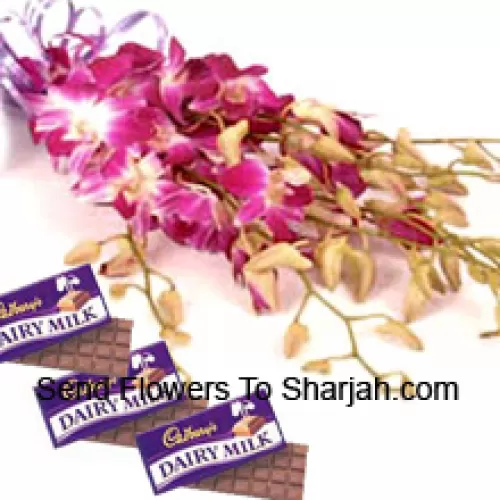 <b>Product Description</b><br><br>A Beautiful Bunch Of Pink Orchids Along With Assorted Cadbury Chocolates<br><br><b>Delivery Information</b><br><br>* The design and packaging of the product can always vary and is subject to the availability of flowers and other products available at the time of delivery.<br><br>* The "Time selected is treated as a preference/request and is not a fixed time for delivery". We only guarantee delivery on a "Specified Date" and not within a specified "Time Frame".