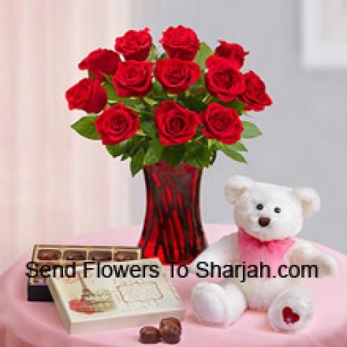 12 belles roses avec un ours en peluche et des chocolats