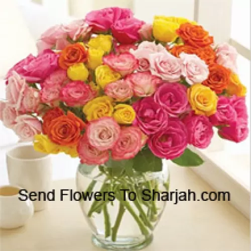 <b>Product Description</b><br><br>36 Mixed Colored Roses With Some Ferns In A Glass Vase<br><br><b>Delivery Information</b><br><br>* The design and packaging of the product can always vary and is subject to the availability of flowers and other products available at the time of delivery.<br><br>* The "Time selected is treated as a preference/request and is not a fixed time for delivery". We only guarantee delivery on a "Specified Date" and not within a specified "Time Frame".
