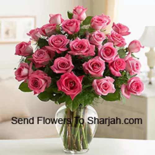 <b>Product Description</b><br><br>36 Pink Roses With Some Ferns In A Glass Vase<br><br><b>Delivery Information</b><br><br>* The design and packaging of the product can always vary and is subject to the availability of flowers and other products available at the time of delivery.<br><br>* The "Time selected is treated as a preference/request and is not a fixed time for delivery". We only guarantee delivery on a "Specified Date" and not within a specified "Time Frame".
