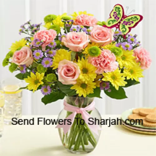 <b>Product Description</b><br><br>Pink Roses, Pink Carnations And Yellow Gerberas With Seasonal Fillers In A Glass Vase -- 24 Stems And Fillers<br><br><b>Delivery Information</b><br><br>* The design and packaging of the product can always vary and is subject to the availability of flowers and other products available at the time of delivery.<br><br>* The "Time selected is treated as a preference/request and is not a fixed time for delivery". We only guarantee delivery on a "Specified Date" and not within a specified "Time Frame".