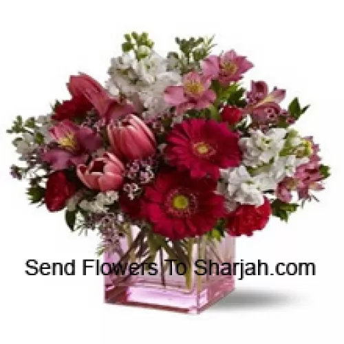 <b>Product Description</b><br><br>Red Roses, Red Tulips And Assorted Flowers With Seasonal Fillers Arranged Beautifully In A Glass Vase<br><br><b>Delivery Information</b><br><br>* The design and packaging of the product can always vary and is subject to the availability of flowers and other products available at the time of delivery.<br><br>* The "Time selected is treated as a preference/request and is not a fixed time for delivery". We only guarantee delivery on a "Specified Date" and not within a specified "Time Frame".