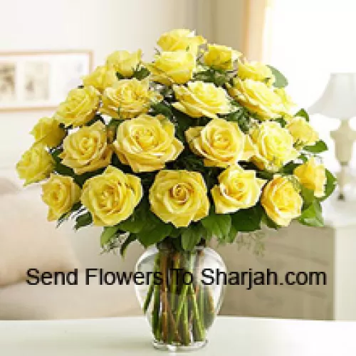 <b>Product Description</b><br><br>24 Yellow Roses With Some Ferns In A Glass Vase<br><br><b>Delivery Information</b><br><br>* The design and packaging of the product can always vary and is subject to the availability of flowers and other products available at the time of delivery.<br><br>* The "Time selected is treated as a preference/request and is not a fixed time for delivery". We only guarantee delivery on a "Specified Date" and not within a specified "Time Frame".