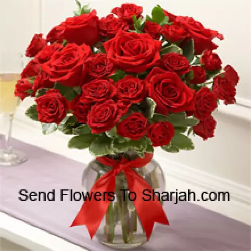 <b>Product Description</b><br><br>36 Red Roses With Some Ferns In A Glass Vase<br><br><b>Delivery Information</b><br><br>* The design and packaging of the product can always vary and is subject to the availability of flowers and other products available at the time of delivery.<br><br>* The "Time selected is treated as a preference/request and is not a fixed time for delivery". We only guarantee delivery on a "Specified Date" and not within a specified "Time Frame".