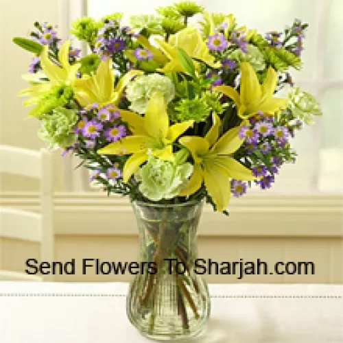 <b>Product Description</b><br><br>Yellow Lilies And Other Assorted Flowers Arranged Beautifully In A Glass Vase<br><br><b>Delivery Information</b><br><br>* The design and packaging of the product can always vary and is subject to the availability of flowers and other products available at the time of delivery.<br><br>* The "Time selected is treated as a preference/request and is not a fixed time for delivery". We only guarantee delivery on a "Specified Date" and not within a specified "Time Frame".