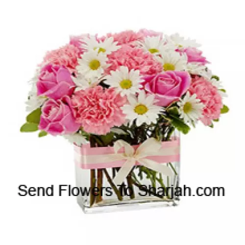 <b>Product Description</b><br><br>Pink Roses, Pink Carnations And Assorted White Seasonal Flowers Arranged Beautifully In A Glass Vase<br><br><b>Delivery Information</b><br><br>* The design and packaging of the product can always vary and is subject to the availability of flowers and other products available at the time of delivery.<br><br>* The "Time selected is treated as a preference/request and is not a fixed time for delivery". We only guarantee delivery on a "Specified Date" and not within a specified "Time Frame".