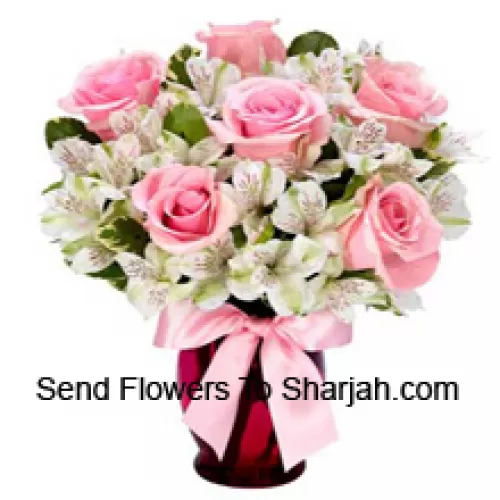 <b>Product Description</b><br><br>Pink Roses And White Alstroemeria Arrannged Beautifully In A Glass Vase<br><br><b>Delivery Information</b><br><br>* The design and packaging of the product can always vary and is subject to the availability of flowers and other products available at the time of delivery.<br><br>* The "Time selected is treated as a preference/request and is not a fixed time for delivery". We only guarantee delivery on a "Specified Date" and not within a specified "Time Frame".