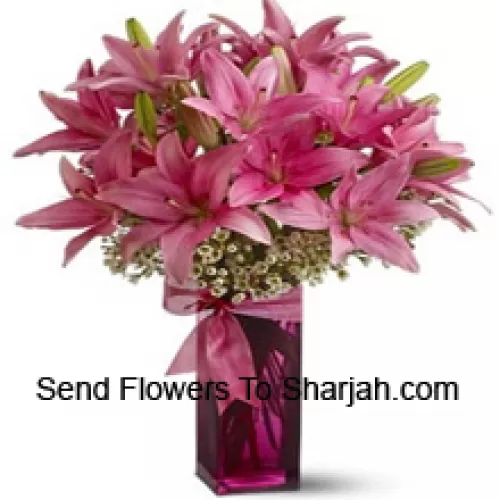 <b>Product Description</b><br><br>Beautiful Pink Lilies With Some Ferns In A Glass Vase<br><br><b>Delivery Information</b><br><br>* The design and packaging of the product can always vary and is subject to the availability of flowers and other products available at the time of delivery.<br><br>* The "Time selected is treated as a preference/request and is not a fixed time for delivery". We only guarantee delivery on a "Specified Date" and not within a specified "Time Frame".