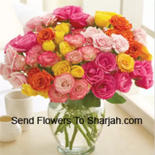 <b>Product Description</b><br><br>50 Mixed Colored Roses Arranged Beautifully In A Glass Vase<br><br><b>Delivery Information</b><br><br>* The design and packaging of the product can always vary and is subject to the availability of flowers and other products available at the time of delivery.<br><br>* The "Time selected is treated as a preference/request and is not a fixed time for delivery". We only guarantee delivery on a "Specified Date" and not within a specified "Time Frame".