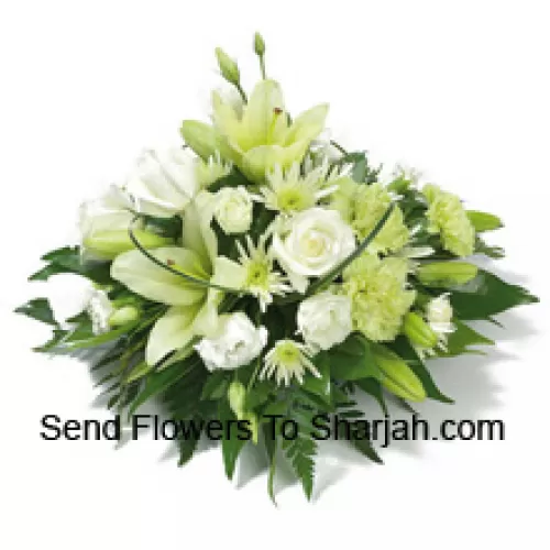 <b>Product Description</b><br><br>A Beautiful Arrangement Of White Roses, White Carnations, White Lilies And Assorted White Flowers With Seasonal Fillers<br><br><b>Delivery Information</b><br><br>* The design and packaging of the product can always vary and is subject to the availability of flowers and other products available at the time of delivery.<br><br>* The "Time selected is treated as a preference/request and is not a fixed time for delivery". We only guarantee delivery on a "Specified Date" and not within a specified "Time Frame".