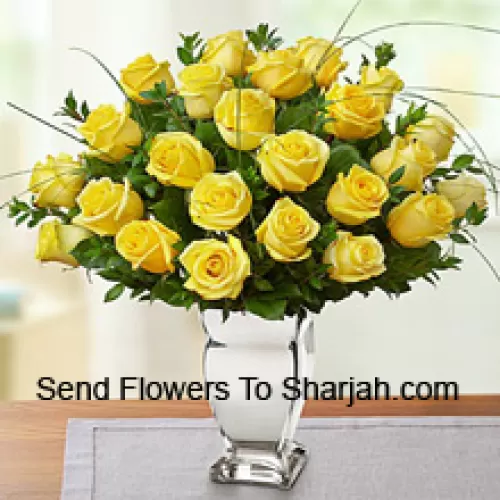 <b>Product Description</b><br><br>24 Yellow Roses With Some Ferns In A Glass Vase<br><br><b>Delivery Information</b><br><br>* The design and packaging of the product can always vary and is subject to the availability of flowers and other products available at the time of delivery.<br><br>* The "Time selected is treated as a preference/request and is not a fixed time for delivery". We only guarantee delivery on a "Specified Date" and not within a specified "Time Frame".