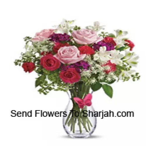 <b>Product Description</b><br><br>Red Roses, Pink Roses, Red Carnations And Other Assorted Flowers With Fillers In A Glass Vase -- 24 Stems And Fillers<br><br><b>Delivery Information</b><br><br>* The design and packaging of the product can always vary and is subject to the availability of flowers and other products available at the time of delivery.<br><br>* The "Time selected is treated as a preference/request and is not a fixed time for delivery". We only guarantee delivery on a "Specified Date" and not within a specified "Time Frame".