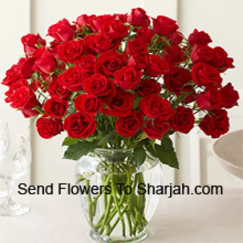 <b>Product Description</b><br><br>50 Red Roses With Some Ferns In A Glass Vase<br><br><b>Delivery Information</b><br><br>* The design and packaging of the product can always vary and is subject to the availability of flowers and other products available at the time of delivery.<br><br>* The "Time selected is treated as a preference/request and is not a fixed time for delivery". We only guarantee delivery on a "Specified Date" and not within a specified "Time Frame".