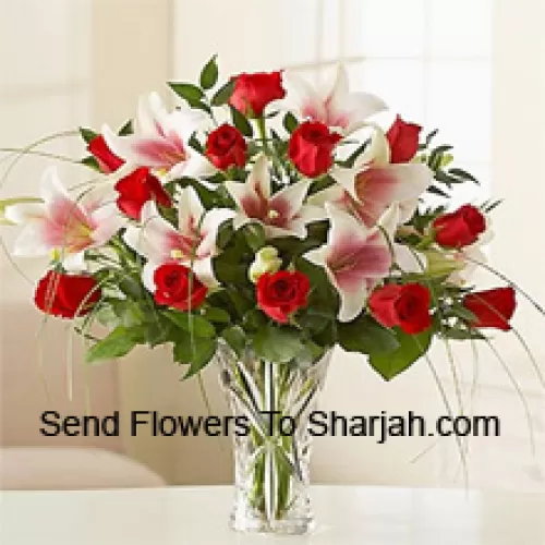 <b>Product Description</b><br><br>Red Roses And Pink Lilies With Seasonal Fillers In A Glass Vase<br><br><b>Delivery Information</b><br><br>* The design and packaging of the product can always vary and is subject to the availability of flowers and other products available at the time of delivery.<br><br>* The "Time selected is treated as a preference/request and is not a fixed time for delivery". We only guarantee delivery on a "Specified Date" and not within a specified "Time Frame".