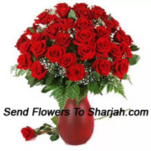 <b>Product Description</b><br><br>40 Red Roses And Seasonal Fillers In A Glass Vase<br><br><b>Delivery Information</b><br><br>* The design and packaging of the product can always vary and is subject to the availability of flowers and other products available at the time of delivery.<br><br>* The "Time selected is treated as a preference/request and is not a fixed time for delivery". We only guarantee delivery on a "Specified Date" and not within a specified "Time Frame".