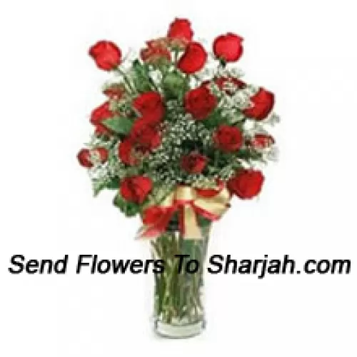 <b>Product Description</b><br><br>24 Red Roses With Some Seasonal Fillers In A Glass Vase<br><br><b>Delivery Information</b><br><br>* The design and packaging of the product can always vary and is subject to the availability of flowers and other products available at the time of delivery.<br><br>* The "Time selected is treated as a preference/request and is not a fixed time for delivery". We only guarantee delivery on a "Specified Date" and not within a specified "Time Frame".