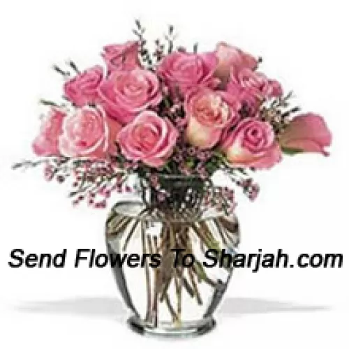 <b>Product Description</b><br><br>Bunch Of 12 Pink Roses With Some Ferns In A Vase<br><br><b>Delivery Information</b><br><br>* The design and packaging of the product can always vary and is subject to the availability of flowers and other products available at the time of delivery.<br><br>* The "Time selected is treated as a preference/request and is not a fixed time for delivery". We only guarantee delivery on a "Specified Date" and not within a specified "Time Frame".