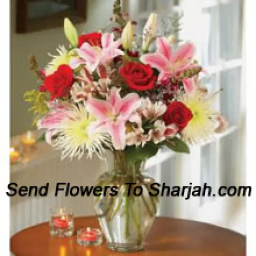 <b>Product Description</b><br><br>Pink Lilies And Red Roses In A Glass Vase<br><br><b>Delivery Information</b><br><br>* The design and packaging of the product can always vary and is subject to the availability of flowers and other products available at the time of delivery.<br><br>* The "Time selected is treated as a preference/request and is not a fixed time for delivery". We only guarantee delivery on a "Specified Date" and not within a specified "Time Frame".