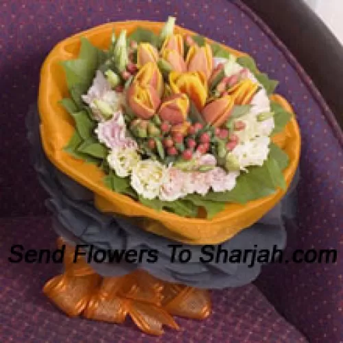 <b>Product Description</b><br><br>Hand Bunch Of Dark Colored Tulips<br><br><b>Delivery Information</b><br><br>* The design and packaging of the product can always vary and is subject to the availability of flowers and other products available at the time of delivery.<br><br>* The "Time selected is treated as a preference/request and is not a fixed time for delivery". We only guarantee delivery on a "Specified Date" and not within a specified "Time Frame".