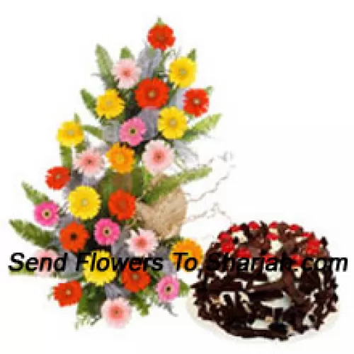 <b>Product Description</b><br><br>Basket Of 25 Mixed Colored Gerberas Along With 1 Kg Chocolate Crisp Cake<br><br><b>Delivery Information</b><br><br>* The design and packaging of the product can always vary and is subject to the availability of flowers and other products available at the time of delivery.<br><br>* The "Time selected is treated as a preference/request and is not a fixed time for delivery". We only guarantee delivery on a "Specified Date" and not within a specified "Time Frame".
