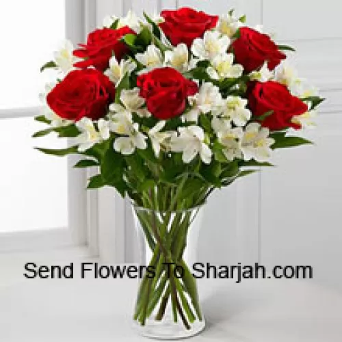 <b>Product Description</b><br><br>6 Red Roses With Assorted White Flowers And Fillers In A Glass Vase<br><br><b>Delivery Information</b><br><br>* The design and packaging of the product can always vary and is subject to the availability of flowers and other products available at the time of delivery.<br><br>* The "Time selected is treated as a preference/request and is not a fixed time for delivery". We only guarantee delivery on a "Specified Date" and not within a specified "Time Frame".
