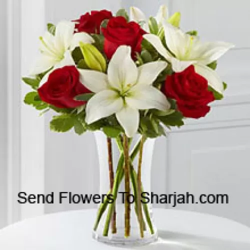 <b>Product Description</b><br><br>Red Roses And White Lilies With Some Seasonal Fillers In A Glass Vase<br><br><b>Delivery Information</b><br><br>* The design and packaging of the product can always vary and is subject to the availability of flowers and other products available at the time of delivery.<br><br>* The "Time selected is treated as a preference/request and is not a fixed time for delivery". We only guarantee delivery on a "Specified Date" and not within a specified "Time Frame".