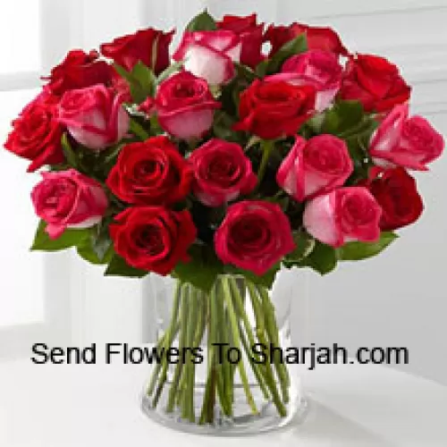 <b>Product Description</b><br><br>24 Roses ( 12 Red And 12 Dual Toned Pink ) With Seasonal Fillers In A Glass Vase<br><br><b>Delivery Information</b><br><br>* The design and packaging of the product can always vary and is subject to the availability of flowers and other products available at the time of delivery.<br><br>* The "Time selected is treated as a preference/request and is not a fixed time for delivery". We only guarantee delivery on a "Specified Date" and not within a specified "Time Frame".