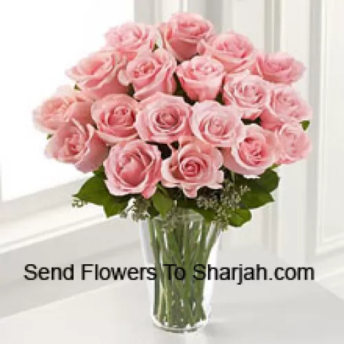 <b>Product Description</b><br><br>18 Pink Roses With Some Ferns In A Vase<br><br><b>Delivery Information</b><br><br>* The design and packaging of the product can always vary and is subject to the availability of flowers and other products available at the time of delivery.<br><br>* The "Time selected is treated as a preference/request and is not a fixed time for delivery". We only guarantee delivery on a "Specified Date" and not within a specified "Time Frame".