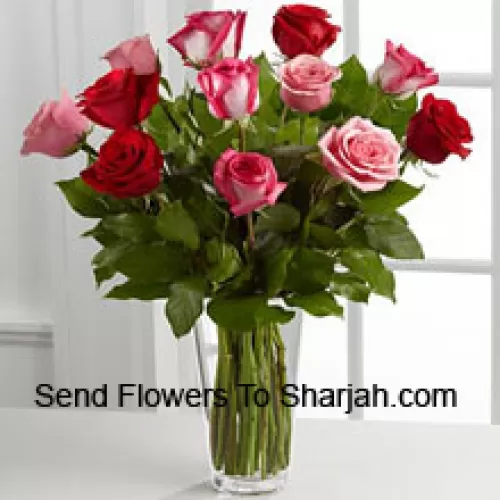 <b>Product Description</b><br><br>4 Red, 4 Pink And 4 Dual Toned Roses With Seasonal Fillers In A Glass Vase<br><br><b>Delivery Information</b><br><br>* The design and packaging of the product can always vary and is subject to the availability of flowers and other products available at the time of delivery.<br><br>* The "Time selected is treated as a preference/request and is not a fixed time for delivery". We only guarantee delivery on a "Specified Date" and not within a specified "Time Frame".