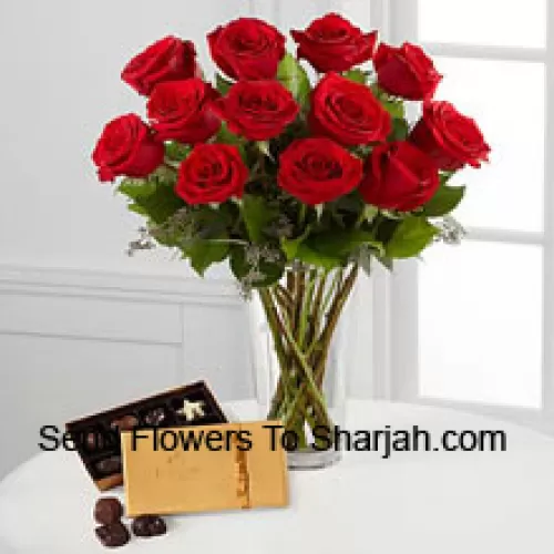 <b>Product Description</b><br><br>12 Red Roses With Some Ferns In A Vase And A Box Of Godiva Chocolates (We reserve the right to substitute the Godiva chocolates with chocolates of equal value in case of non-availability of the same. Limited Stock)<br><br><b>Delivery Information</b><br><br>* The design and packaging of the product can always vary and is subject to the availability of flowers and other products available at the time of delivery.<br><br>* The "Time selected is treated as a preference/request and is not a fixed time for delivery". We only guarantee delivery on a "Specified Date" and not within a specified "Time Frame".