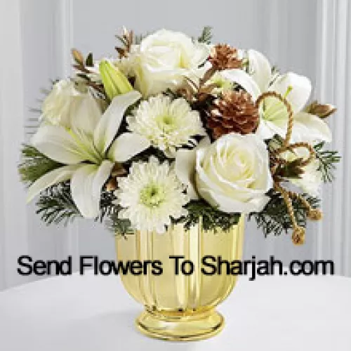 A highly sophisticated expression of the season's most dazzling moments. Snowy white roses, Asiatic lilies and chrysanthemums shed their light and beauty arranged amongst myrtle stems and assorted holiday greens. Accented by gold pinecones and gold cording and placed in a gold pedestal vase, this bouquet creates a wonderful wish for a truly wondrous holiday season. (Please Note That We Reserve The Right To Substitute Any Product With A Suitable Product Of Equal Value In Case Of Non-Availability Of A Certain Product)