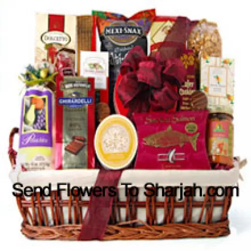 This special EID gift basket is all decked out and ready for the party. We've included plenty of ready to eat gourmet food for them to enjoy, like Ghirardelli Chocolate Raspberry Squares, Pistachios, White Corn Chips and Salsa, Chocolate Wafer Cookies, Dolcetto Wafer Rolls, Amaretto Almond Cookies, Chocolate Covered Cherries, Smoked Salmon, Brie Cheese, Cracked Pepper Crackers, Cheese Straws, Chocolate Covered Sandwich Cookies, and Mocha Almonds. (Please Note That We Reserve The Right To Substitute Any Product With A Suitable Product Of Equal Value In Case Of Non-Availability Of A Certain Product)